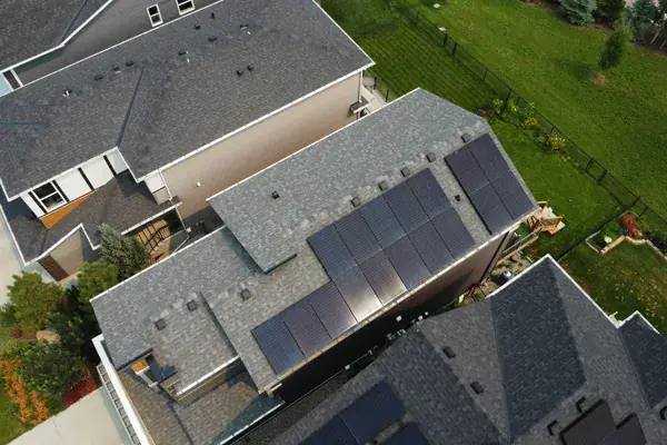 Solar company Calgary — a completed installation on a two-storey home, aerial view